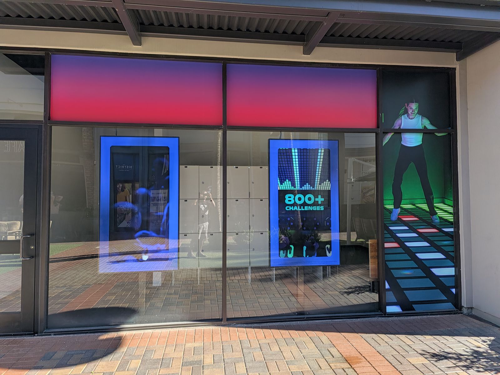 Activate Games Tustin entrance windows with 800 plus challenges screen