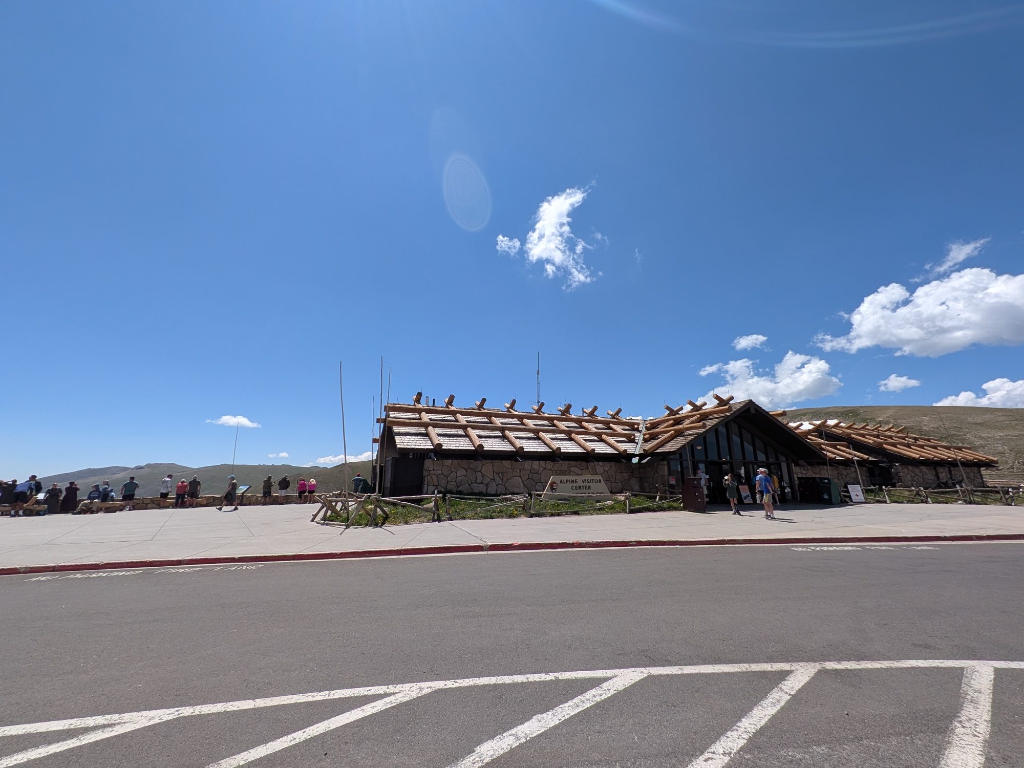 Alpine Visitor Center building on Trail Ridge Road under a blue sky