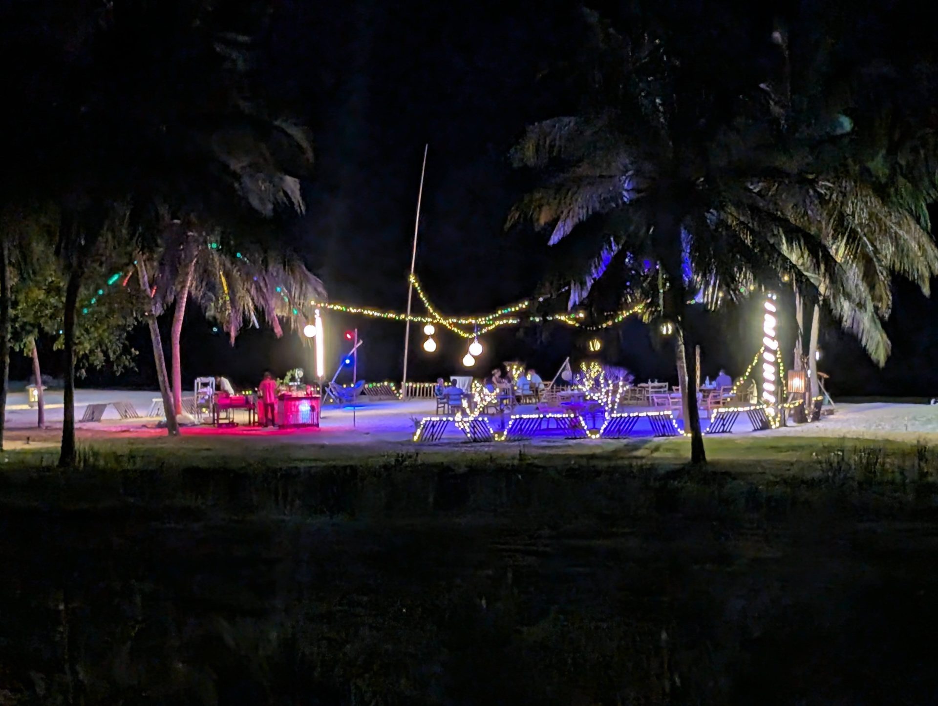Colorful lights on the beach dining area at Anantaya Pasikudah