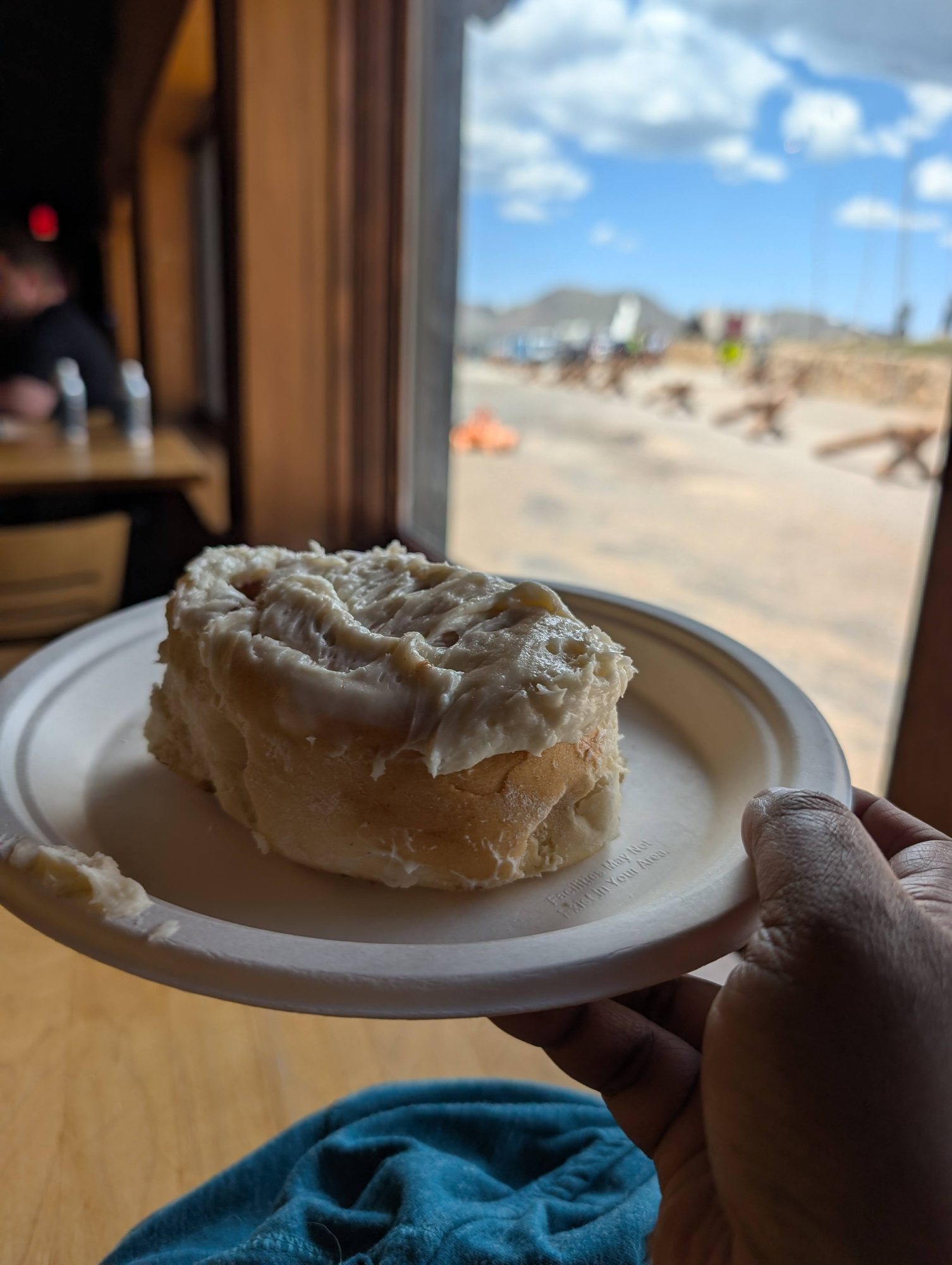 Large frosted cinnamon roll from the cafe at the Alpine Visitor Center