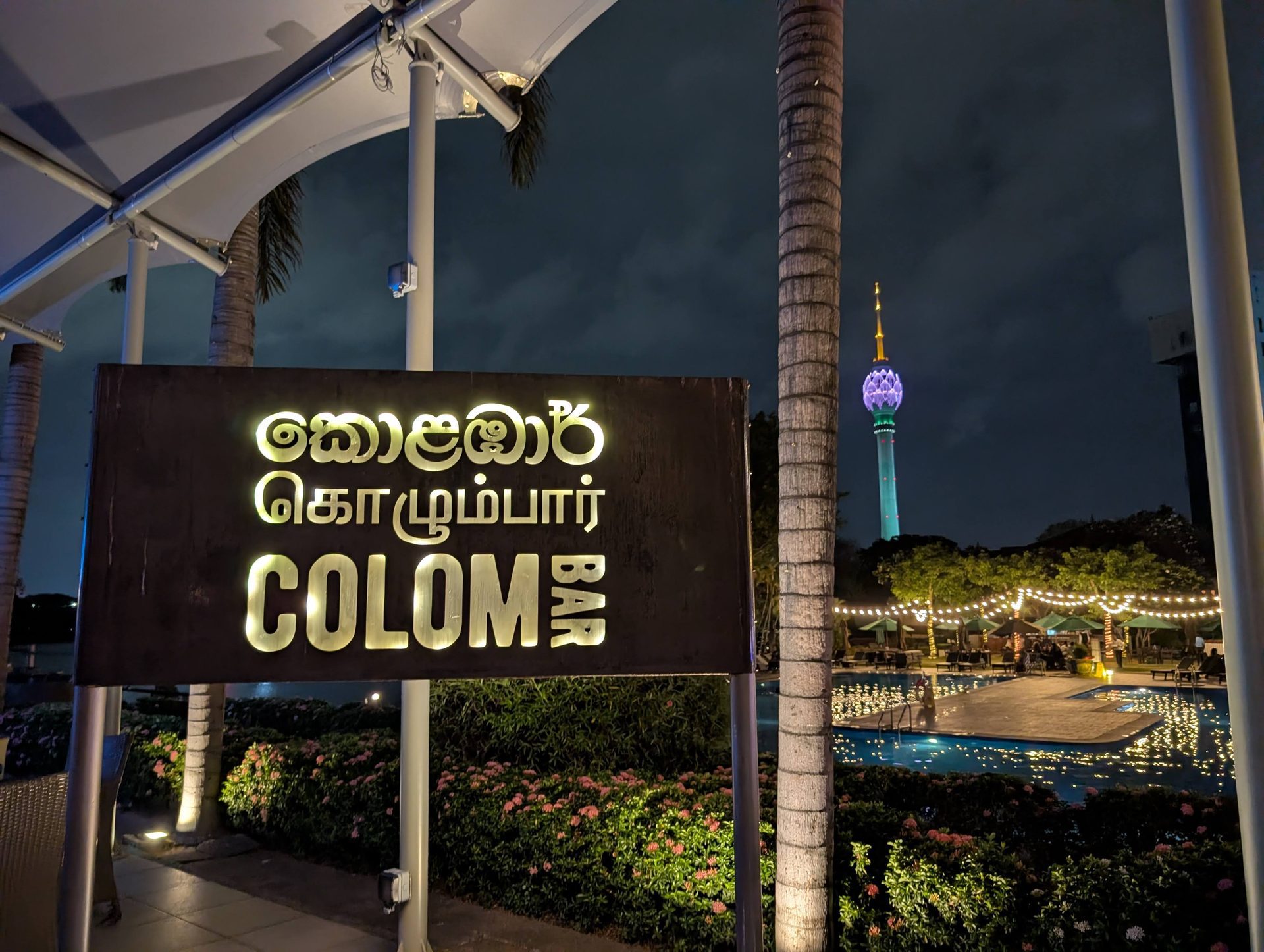 ColomBar sign at Cinnamon Lakeside with the Lotus Tower in the background