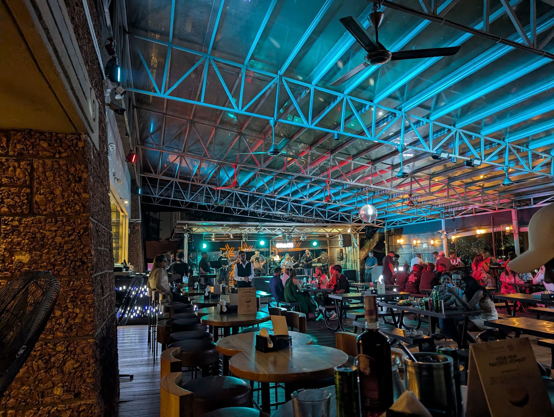 Live music and tables under the roof at ColomBar