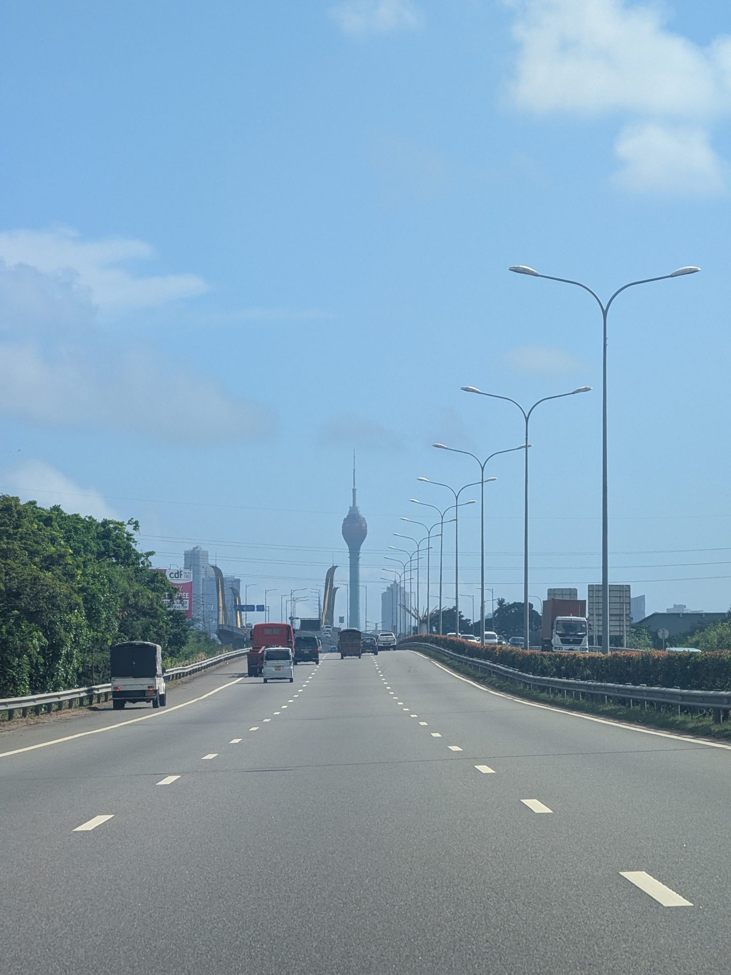 Highway into Colombo with the Lotus Tower ahead