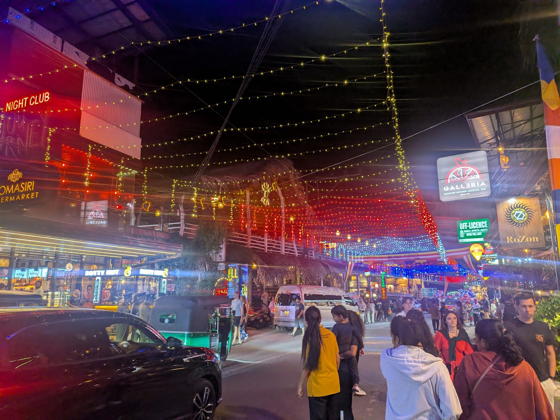 Ella main street decorated with lights at night