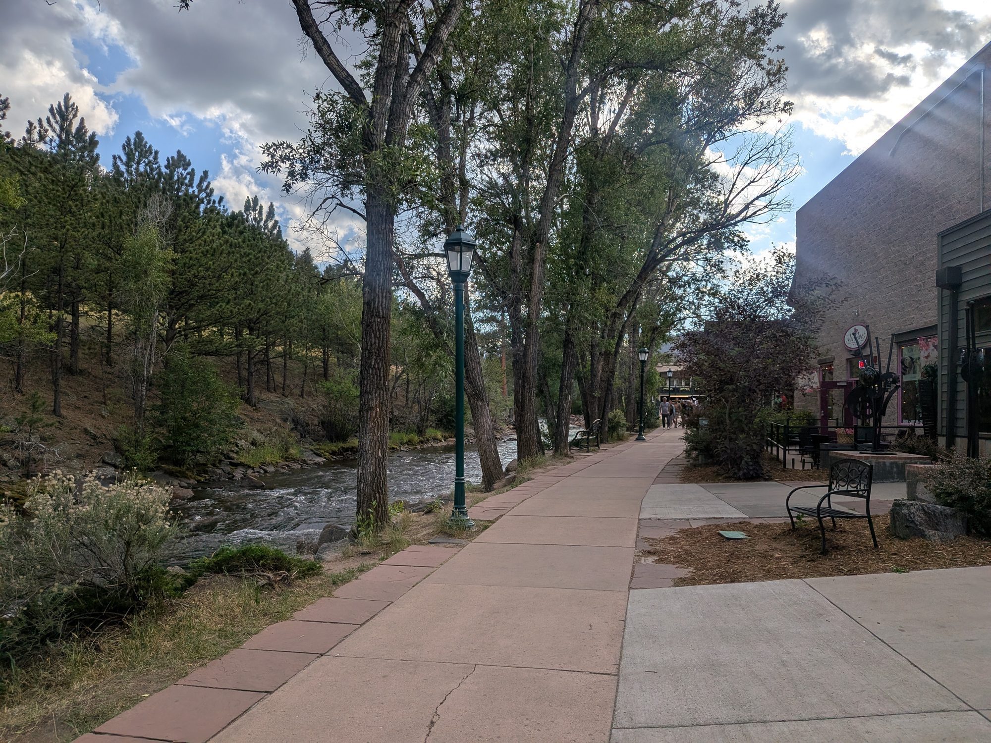 Big Thompson River flowing beside the Estes Park Riverwalk sidewalk
