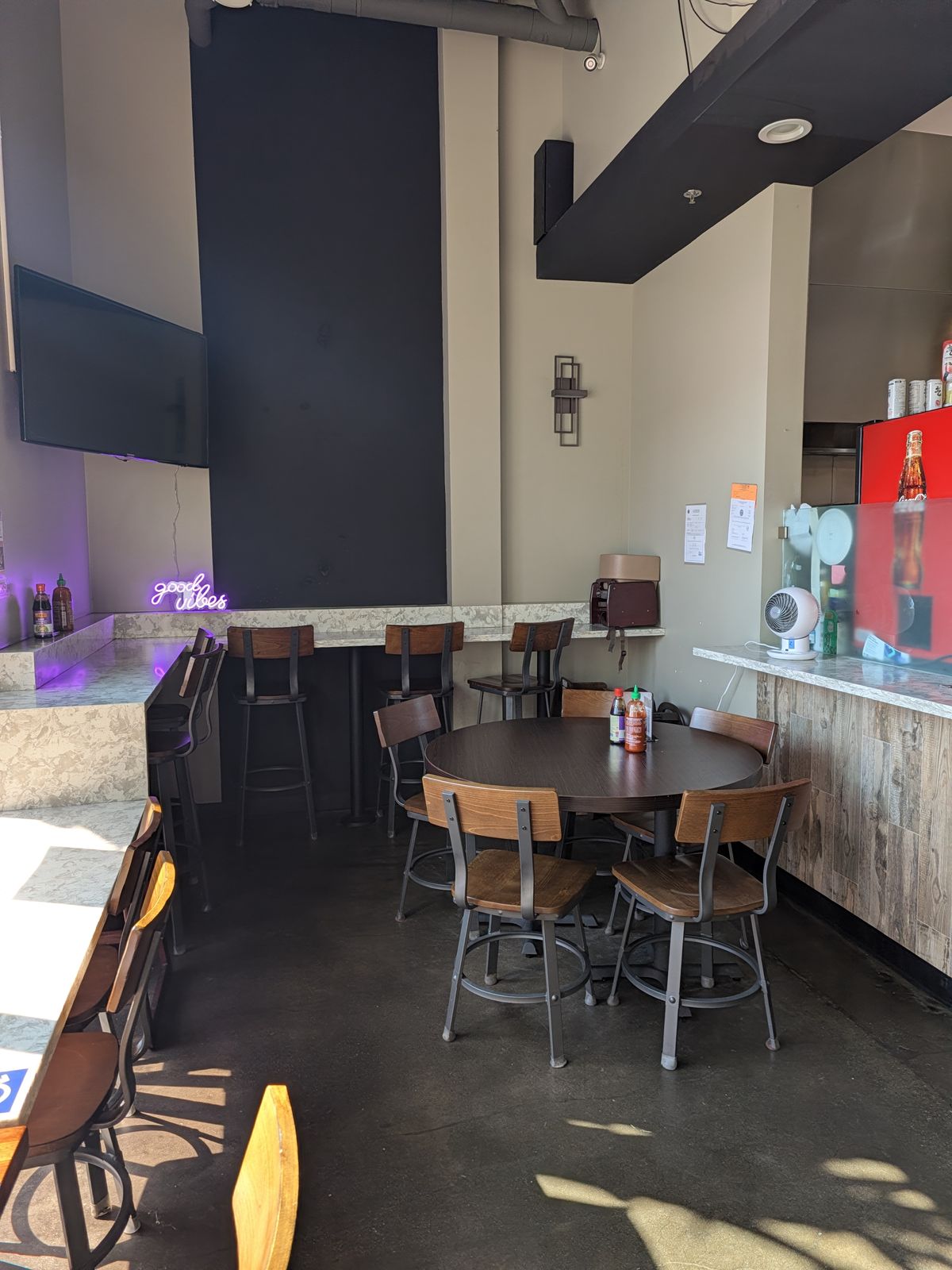 Tables and chairs in the Fire Pho dining room