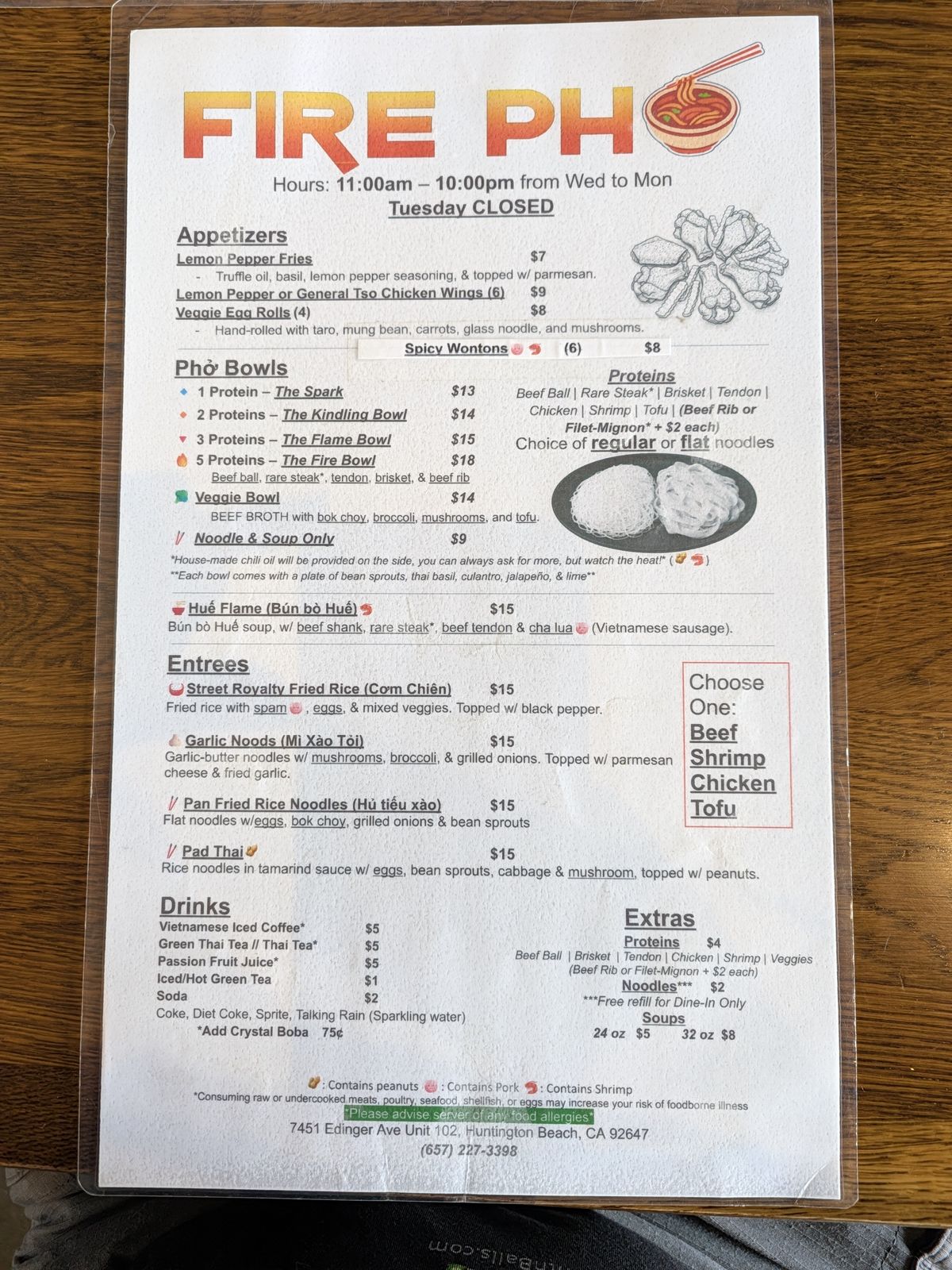 Fire Pho menu listing the Spark, Kindling, Flame and Fire pho bowls