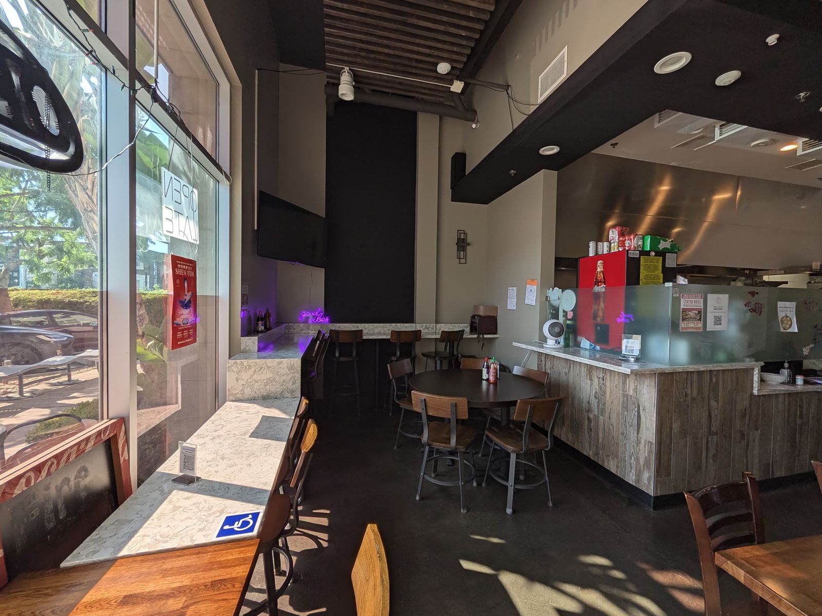 Order counter and seating at Fire Pho