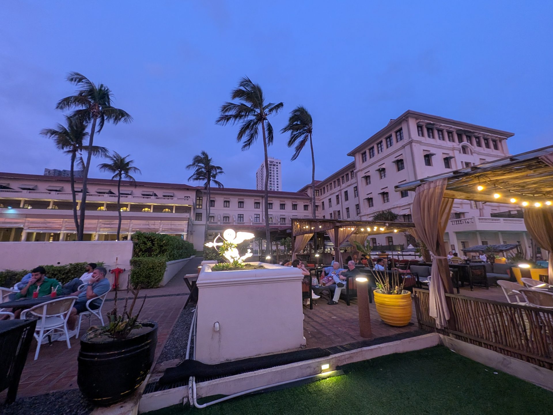 Outdoor terrace at the Galle Face Hotel in the evening