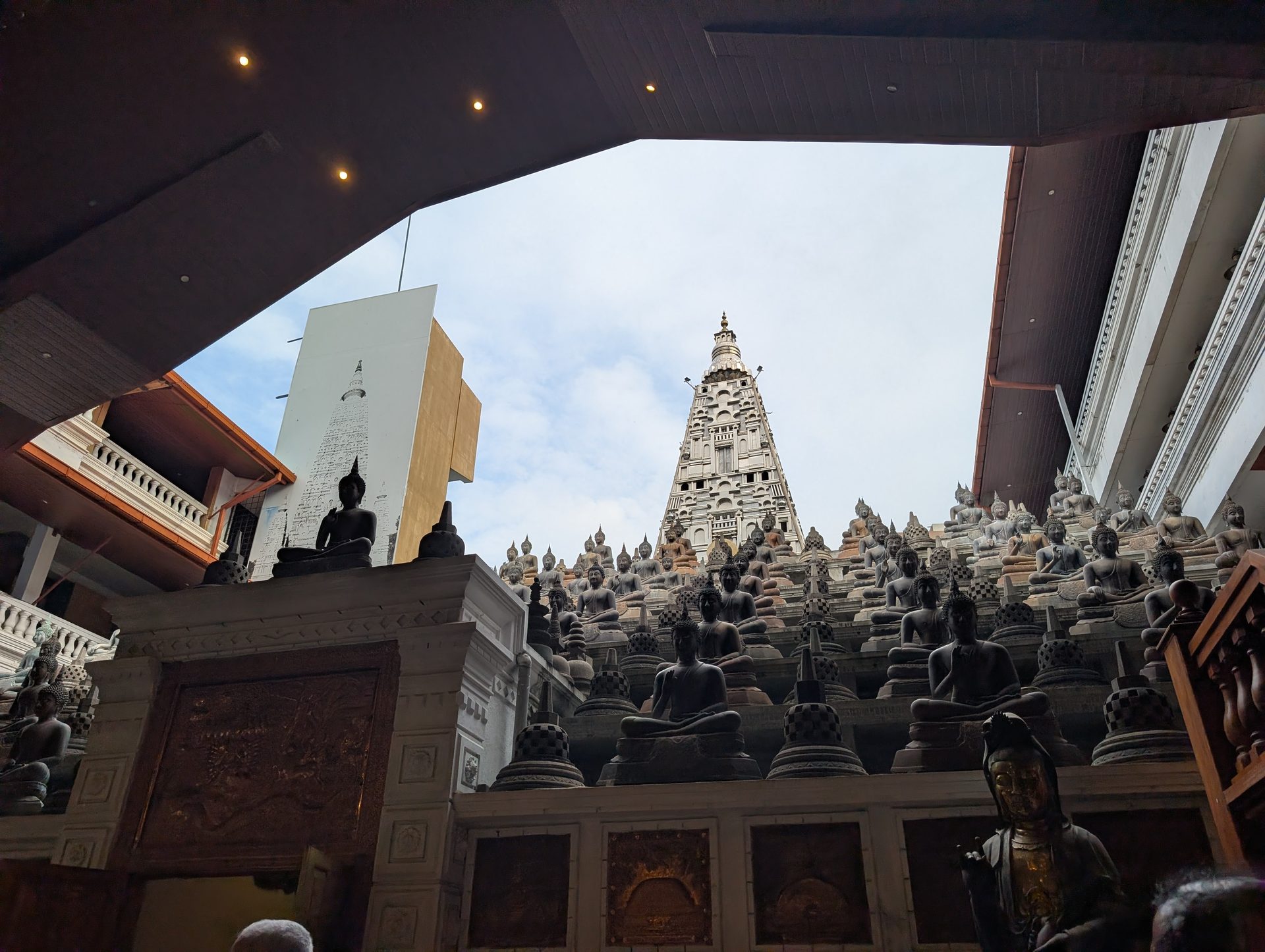 Rows of Buddha statues at Gangaramaya Temple