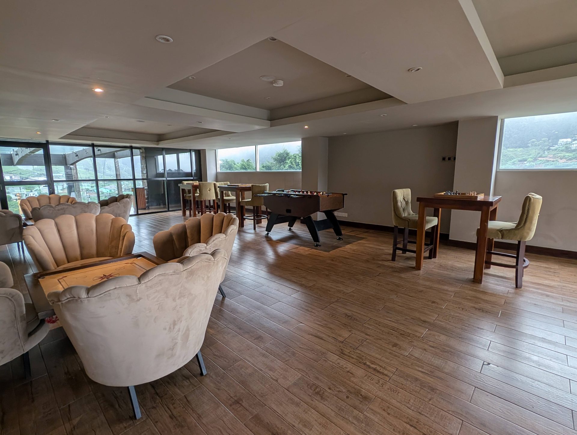 Lounge with games at The Golden Ridge Hotel