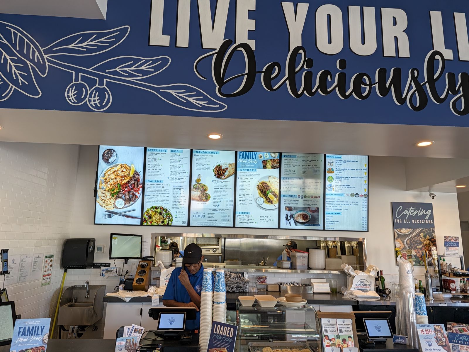 Order counter and menu boards at The Great Greek Irvine