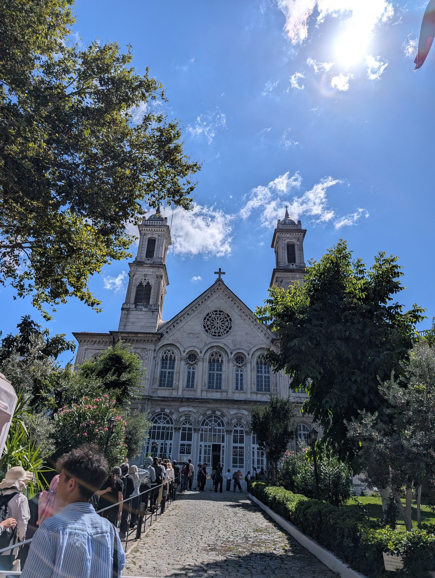 Hagia Triada Greek Orthodox Church entrance and garden