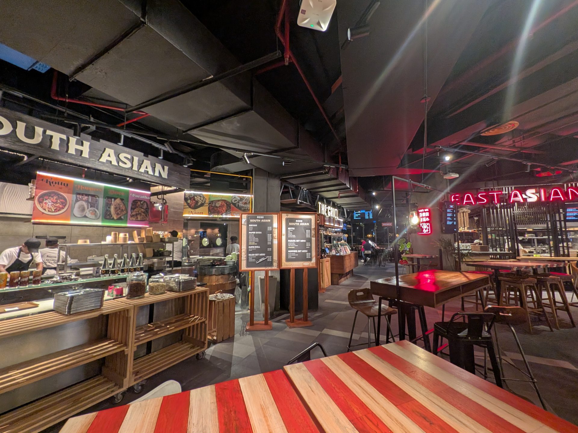 Food court at Havelock City Mall with South Asian and East Asian counters