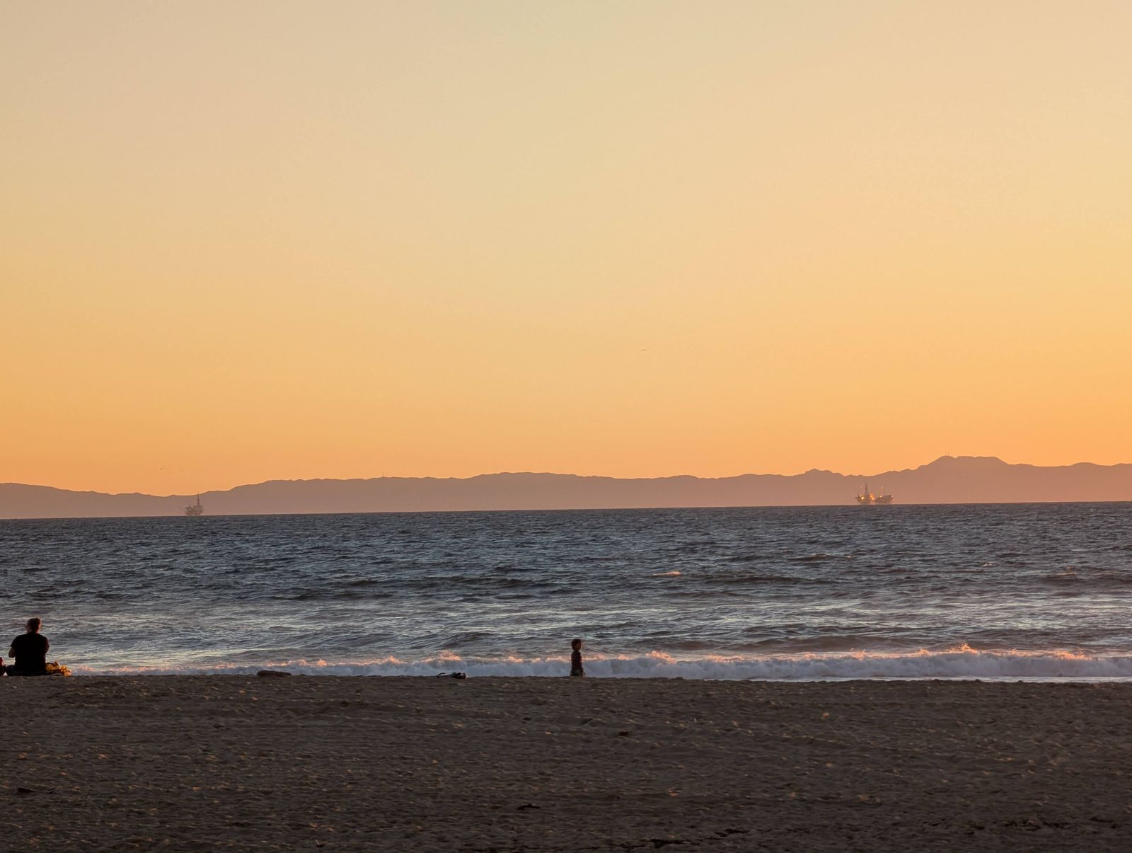 Sunset over the ocean with Catalina Island on the horizon from Huntington Beach