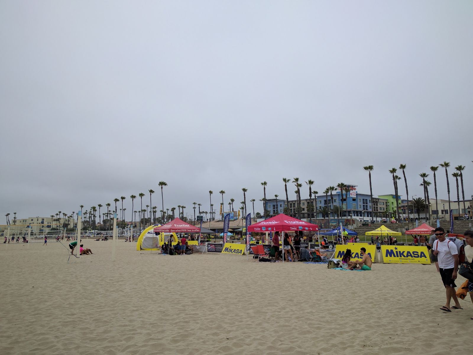 Beach volleyball tournament tents on the sand at Huntington Beach