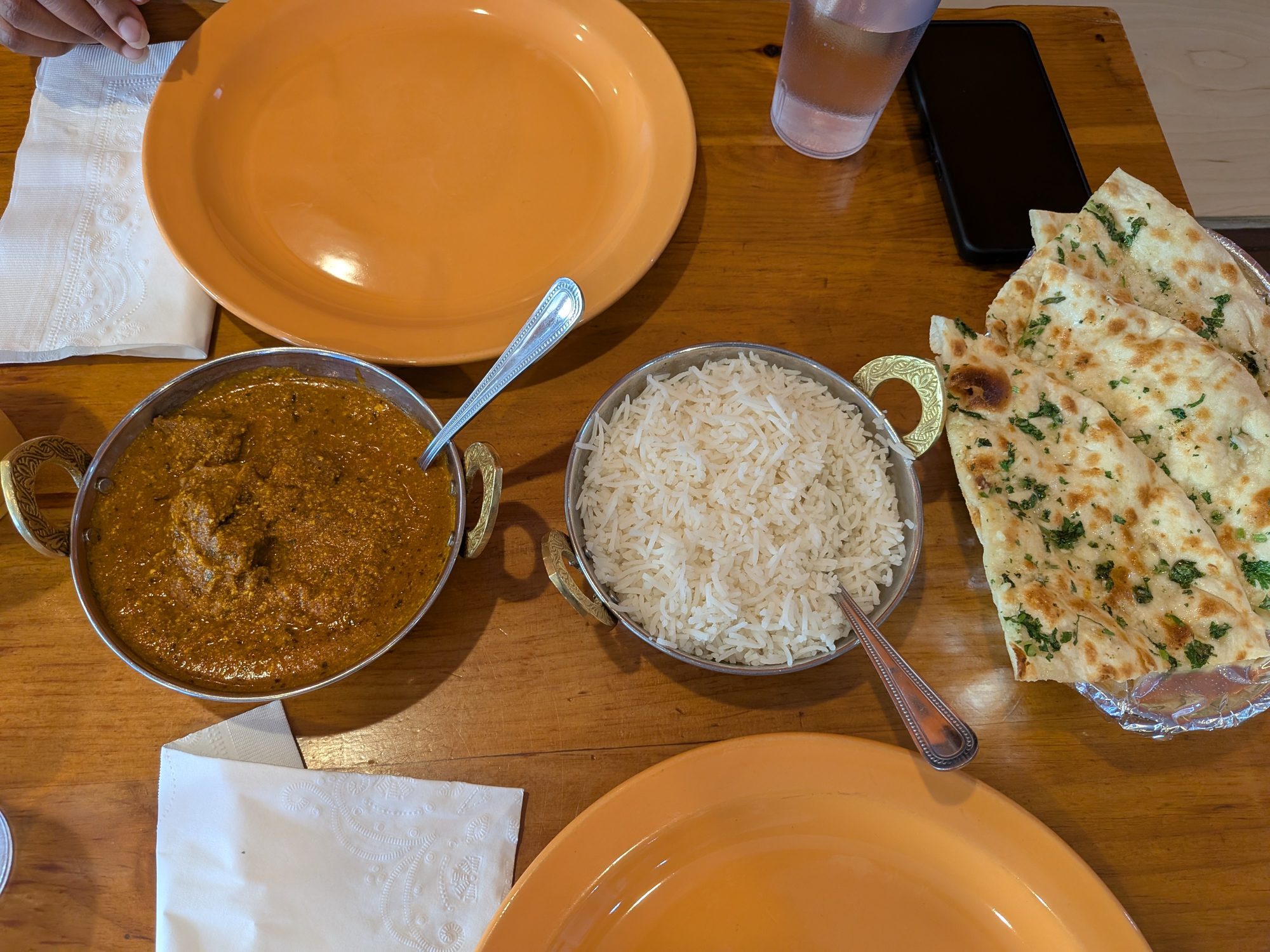 Lamb rogan josh, basmati rice, and garlic naan at Indian Bites in Estes Park