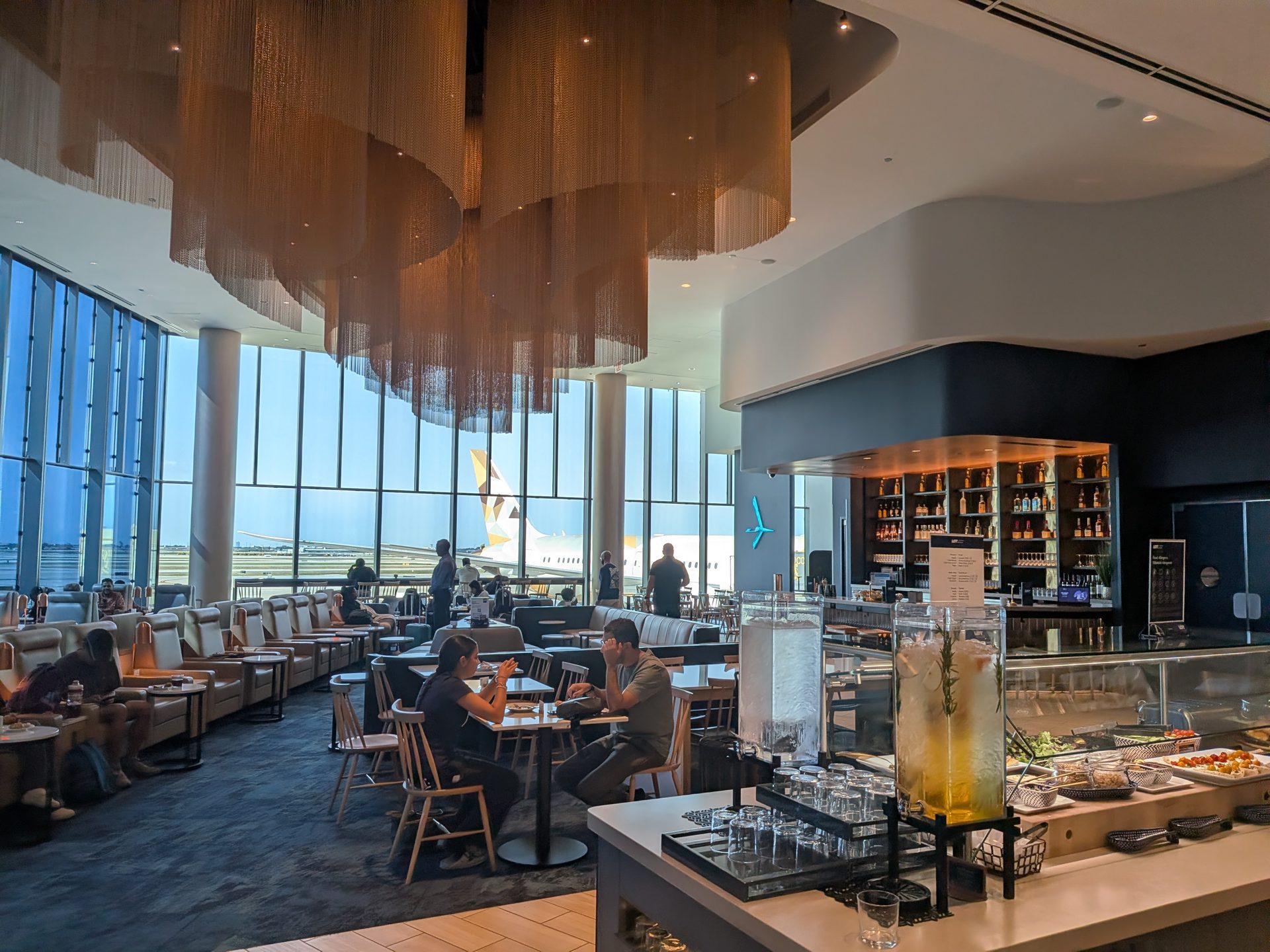 Seating area and windows in the LOT business lounge at Chicago O'Hare Terminal 5