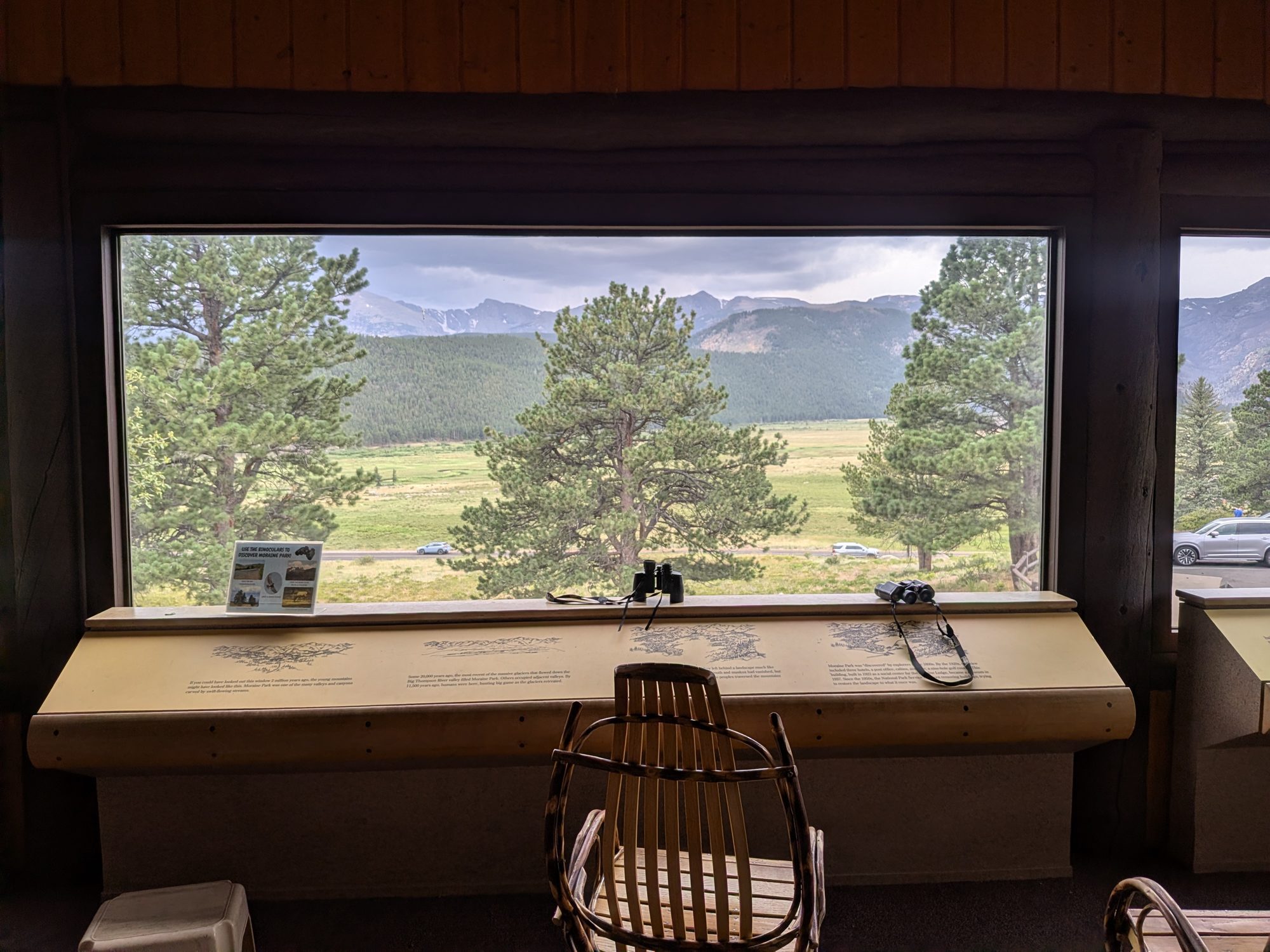 Picture window at the Moraine Park Discovery Center looking out over the meadow
