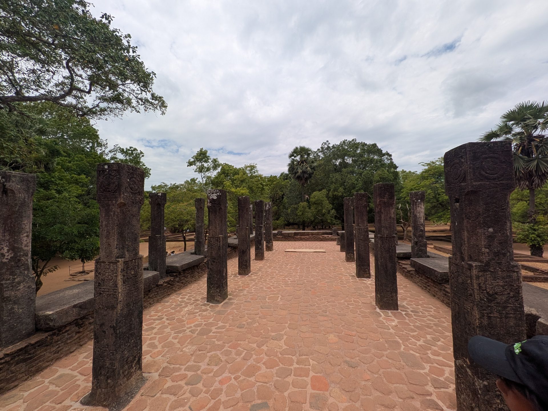 Rows of stone pillars in a hall in Polonnaruwa
