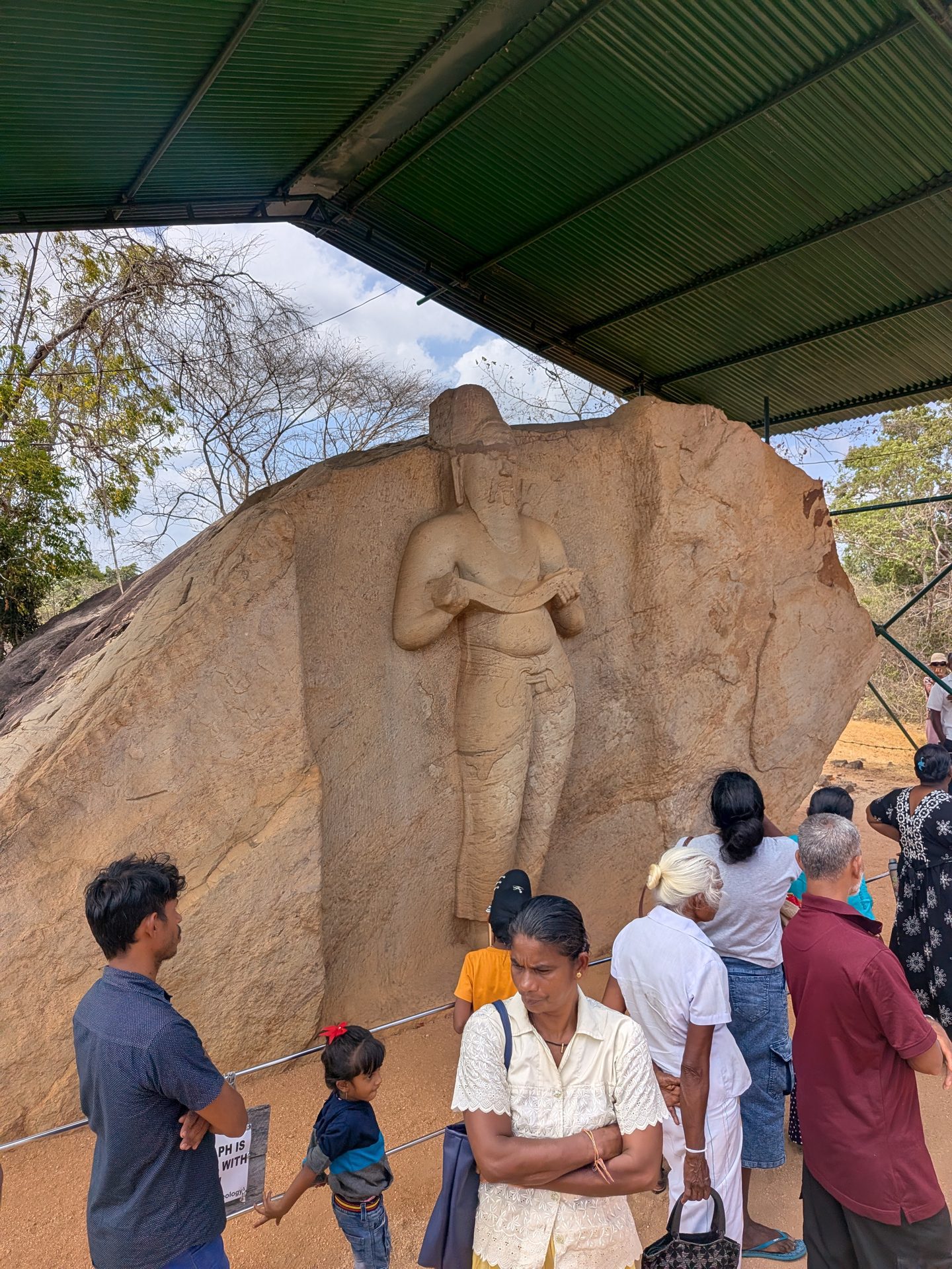 Potgul Vehera statue carved into a boulder in Polonnaruwa