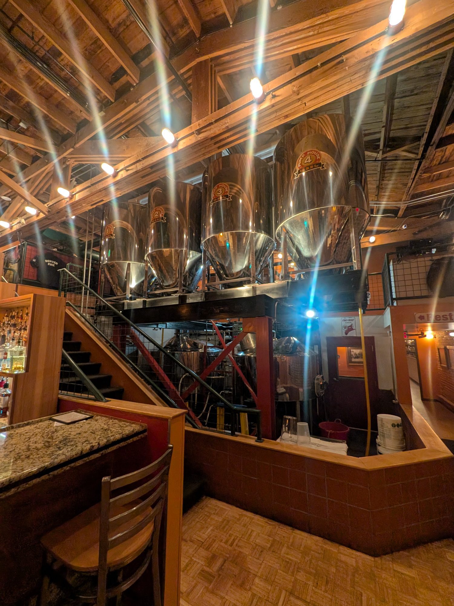 Brewing tanks and wood interior inside Pumphouse Brewery in Longmont