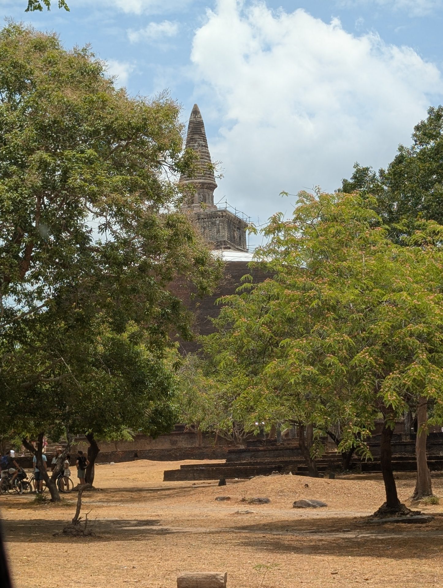 Rankoth Vehera stupa through the trees in Polonnaruwa