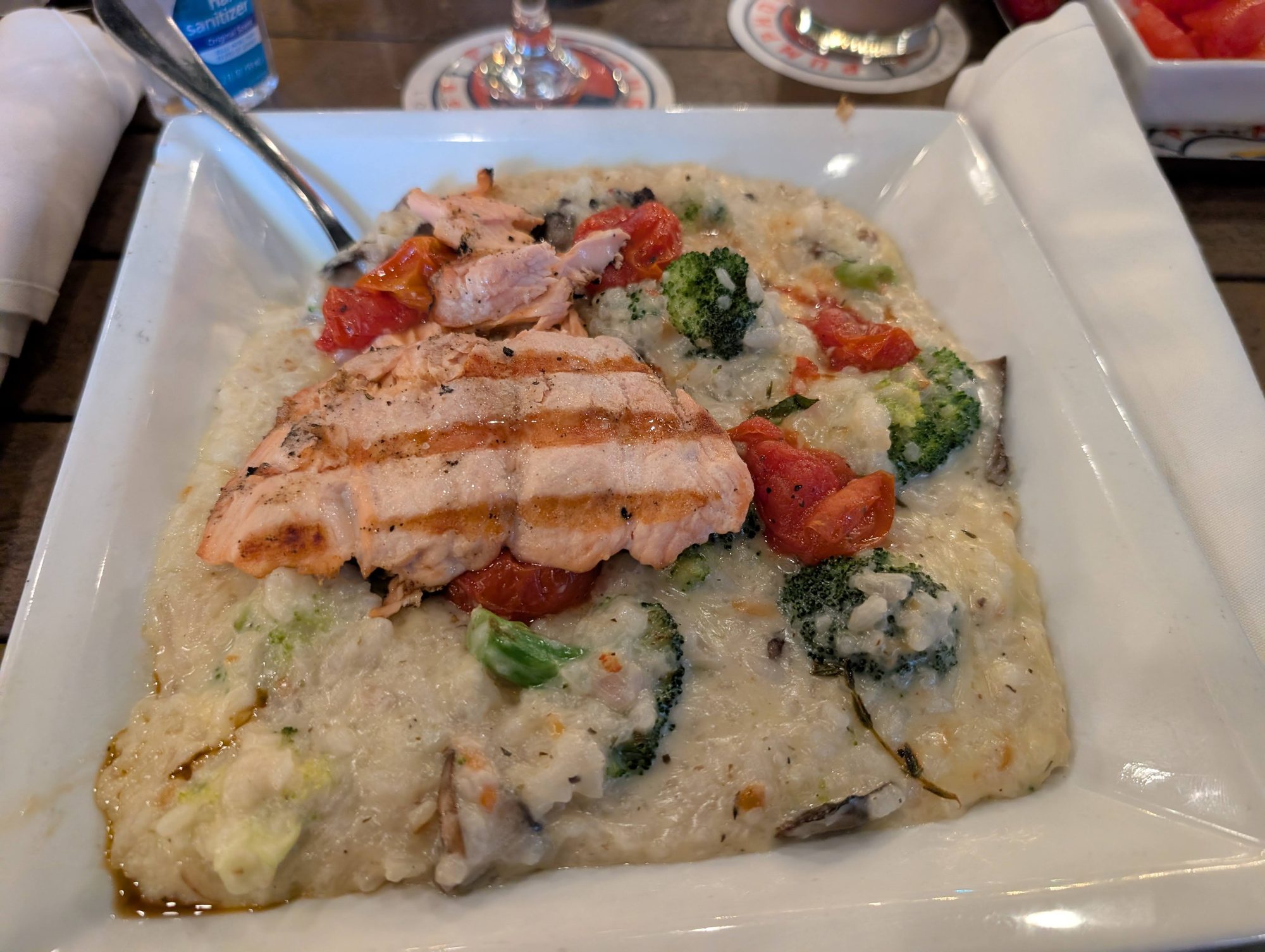 Grilled salmon over vegetable risotto at Pumphouse Brewery