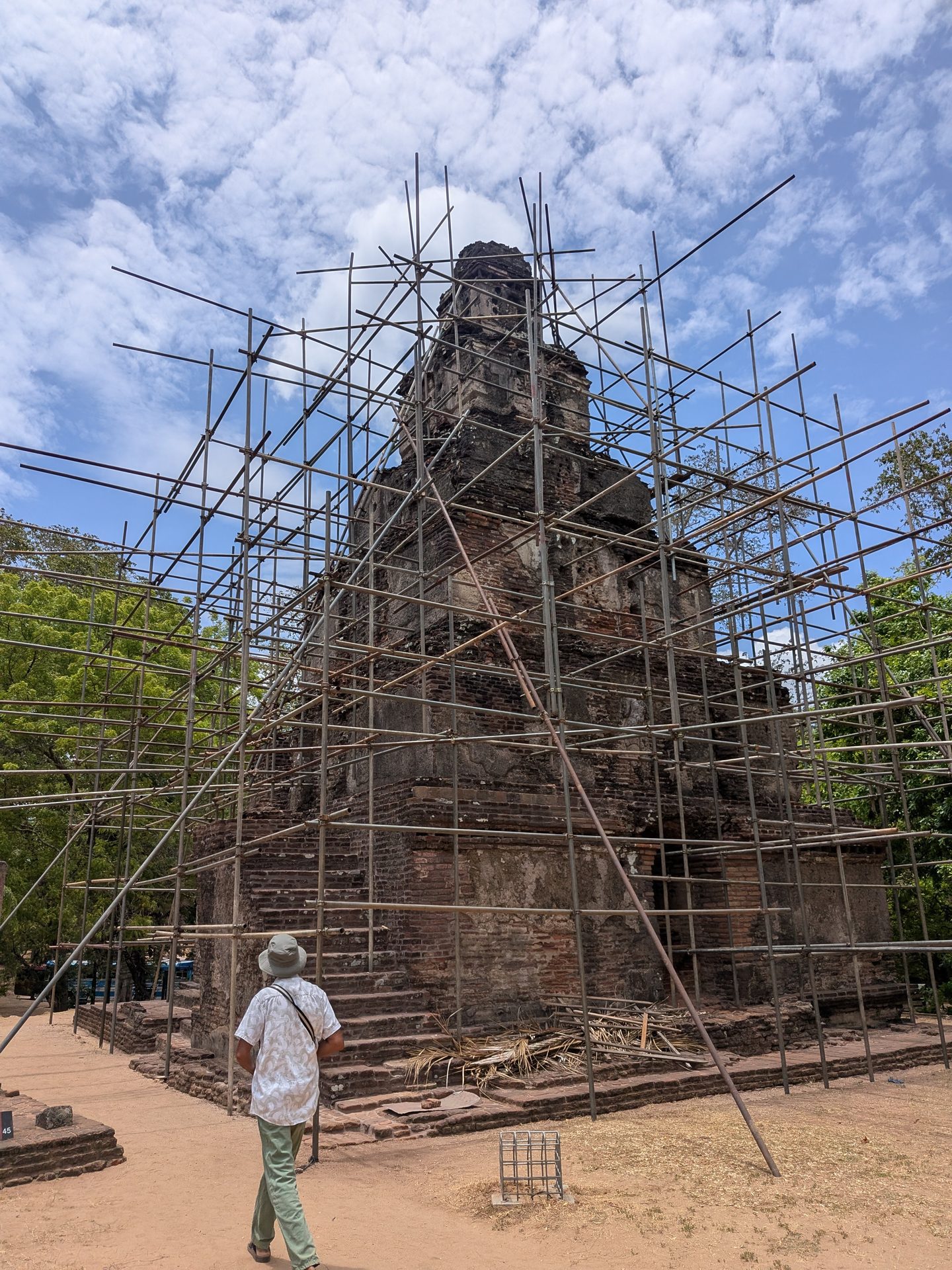 Satmahal Prasada under scaffolding in Polonnaruwa