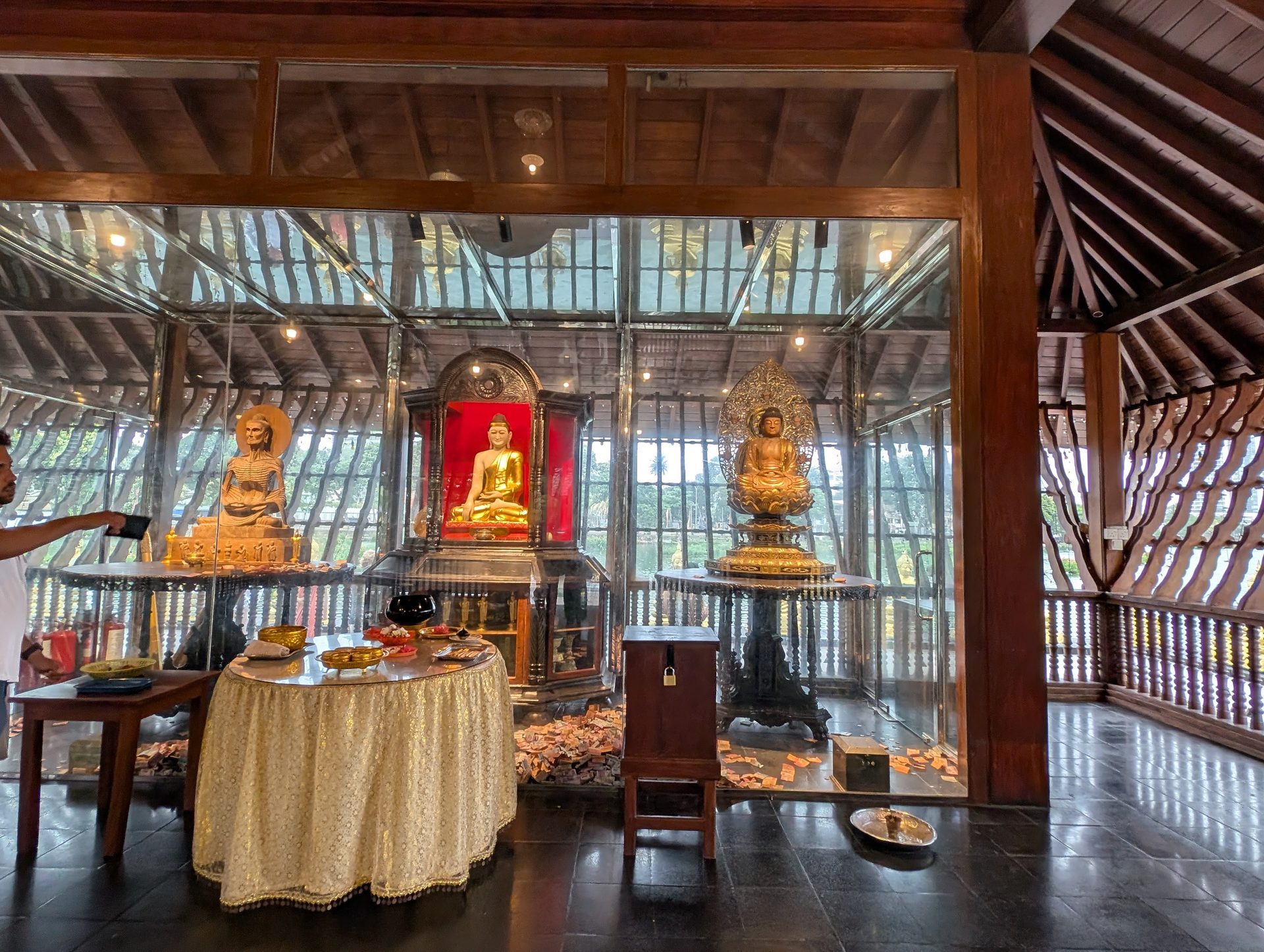 Golden Buddha statues inside the Seema Malaka shrine