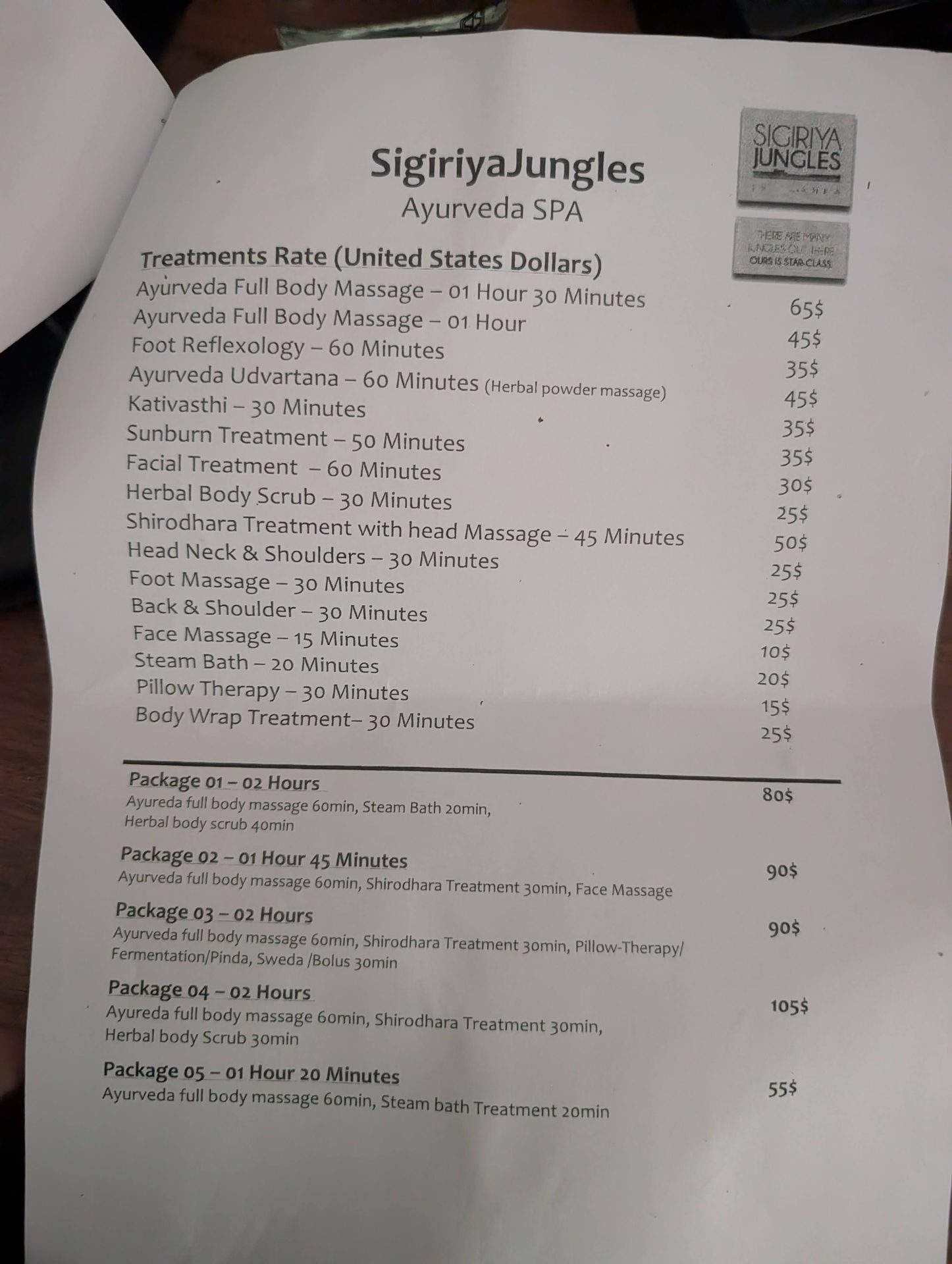 Ayurveda spa treatment menu with US dollar prices at Sigiriya Jungles