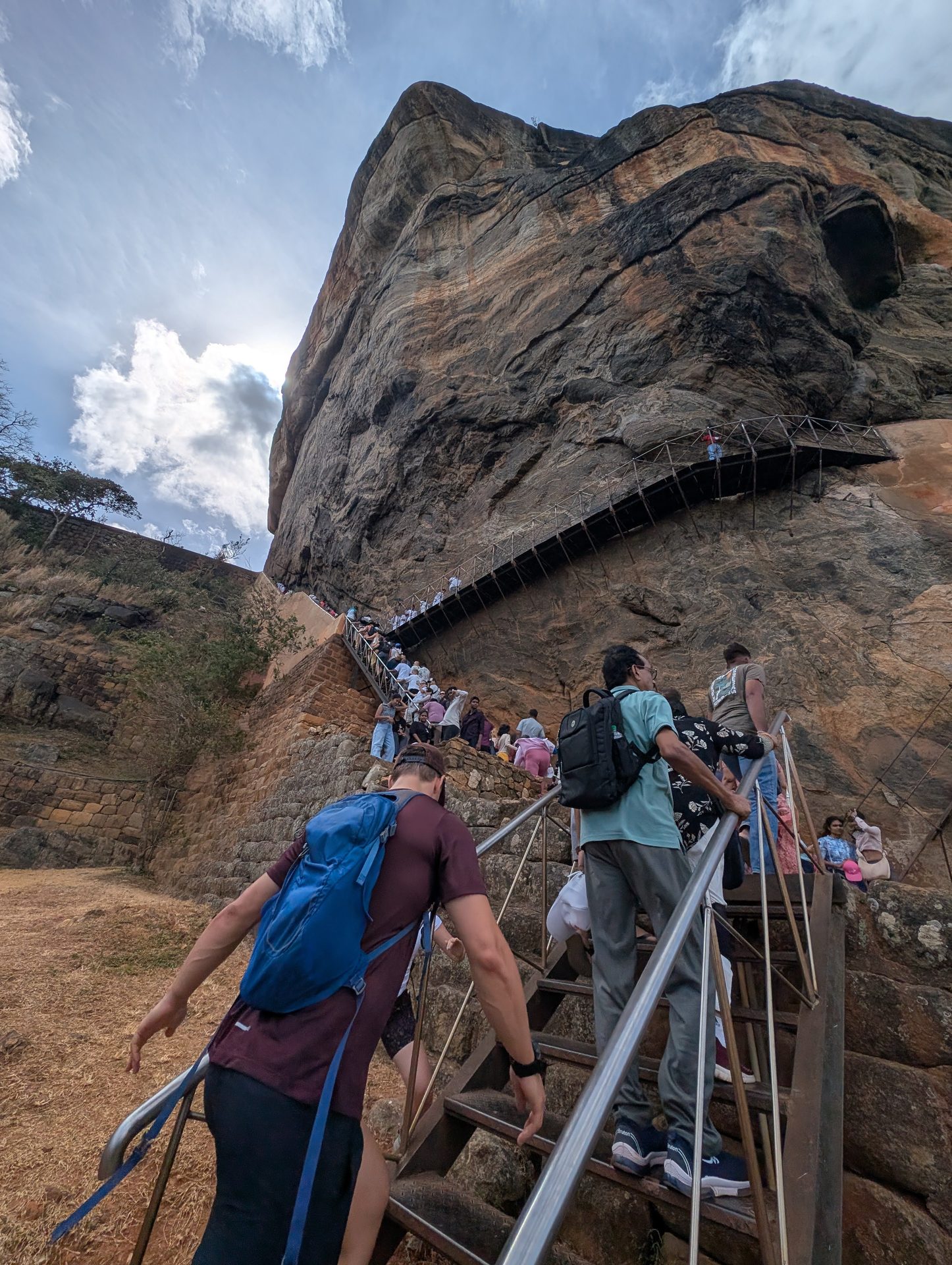 Crowded metal staircase to the Sigiriya frescoes