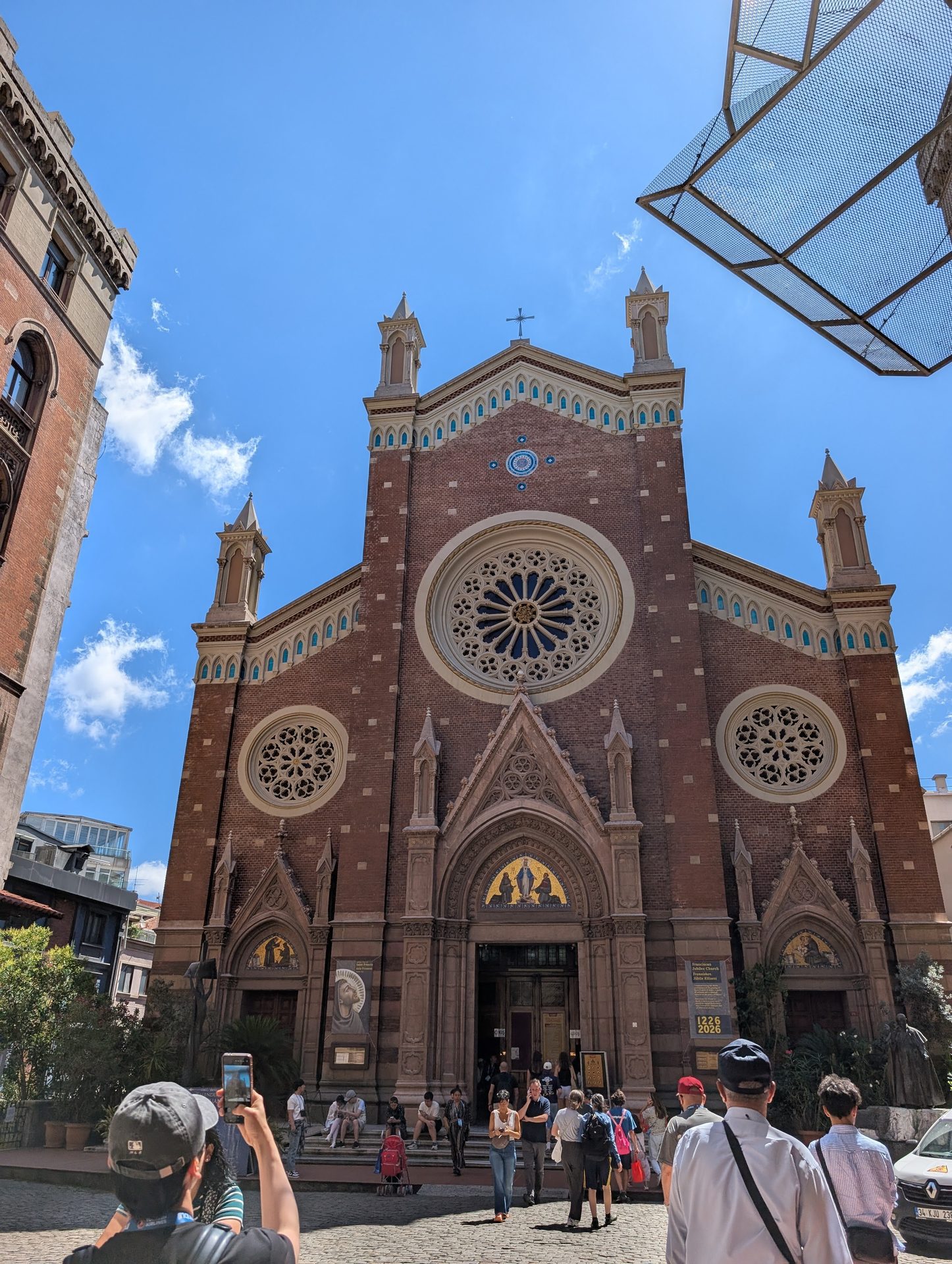 Red brick facade of St. Anthony of Padua Church on İstiklal Avenue