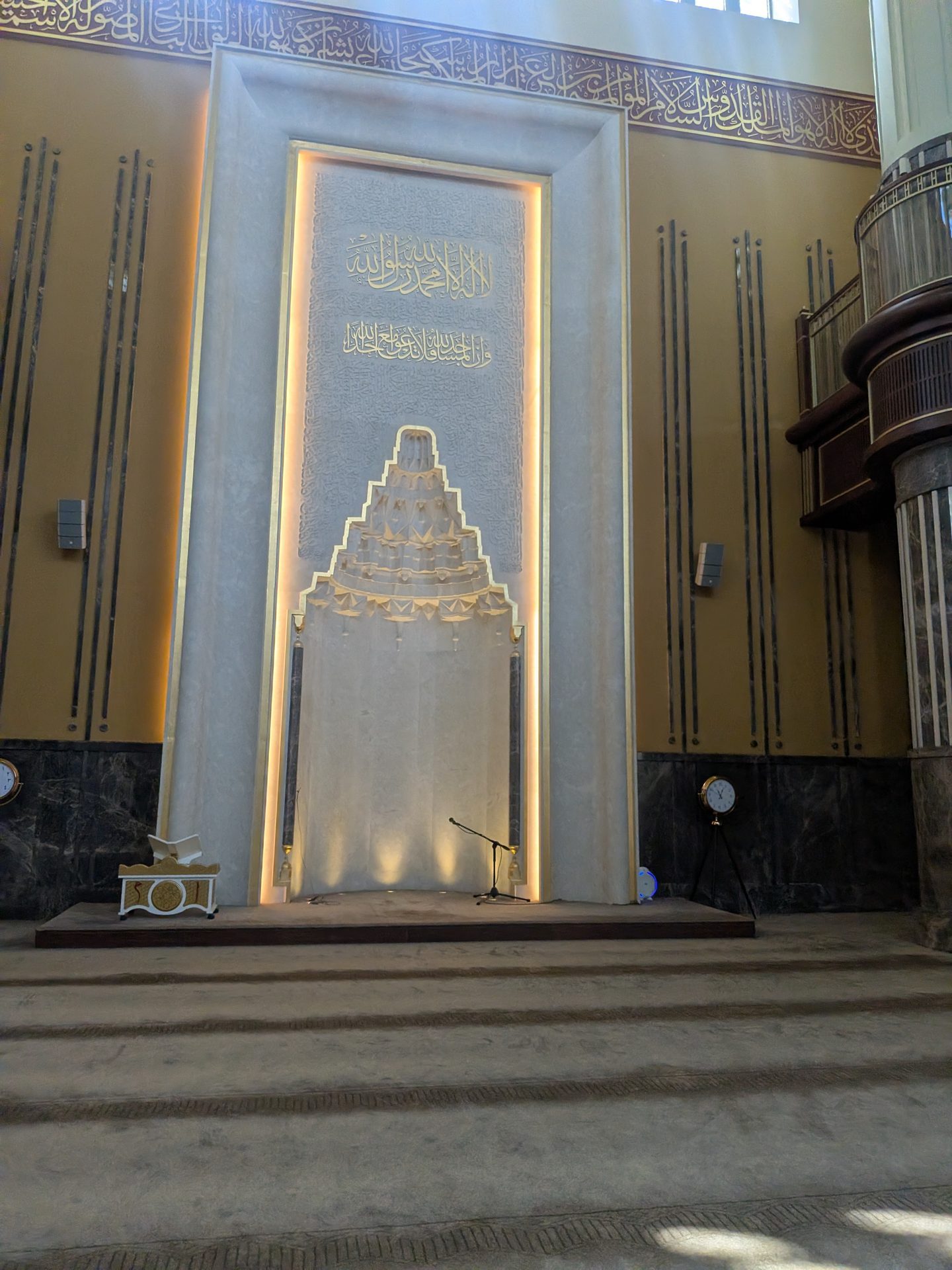 The lit mihrab inside Taksim Mosque