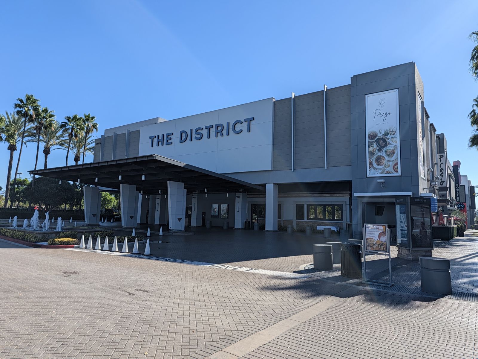 The District at Tustin Legacy shopping center entrance on a sunny day