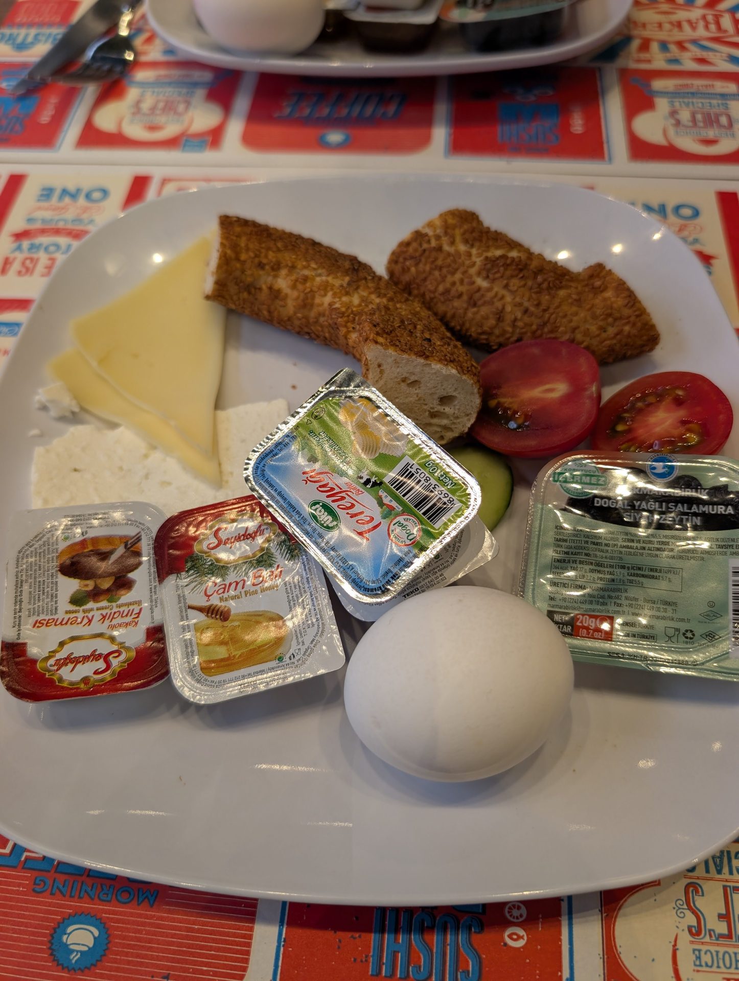 Touristanbul breakfast plate with cheese, egg, tomato and simit