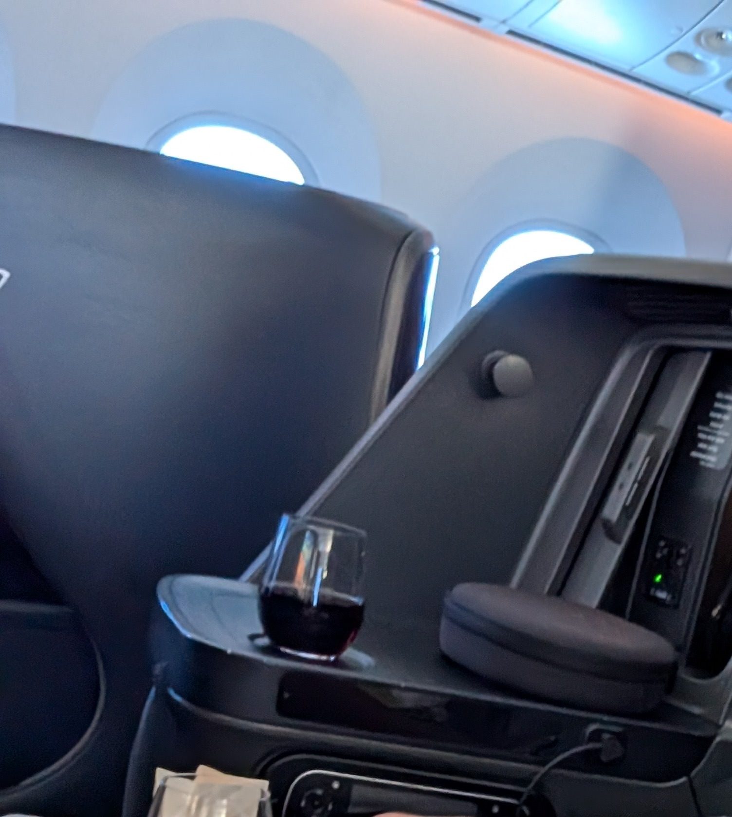 Side console and headphones in the Turkish Airlines 787-9 business class seat