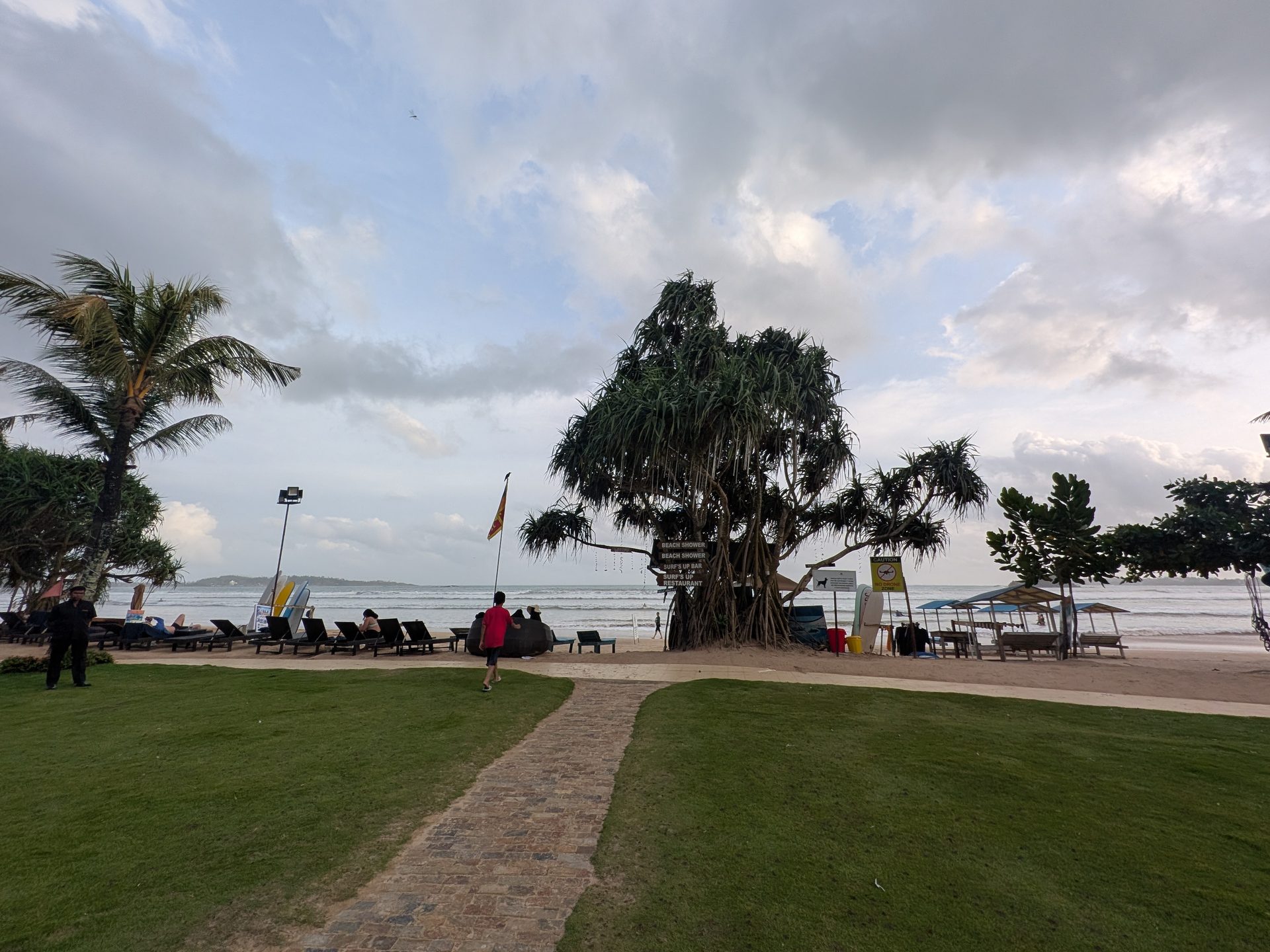 Lawn leading to the beach at the Weligama Bay Marriott