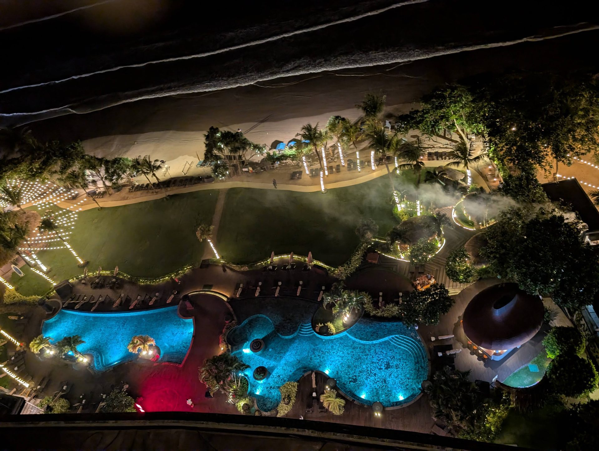 Weligama Bay Marriott pools lit up at night