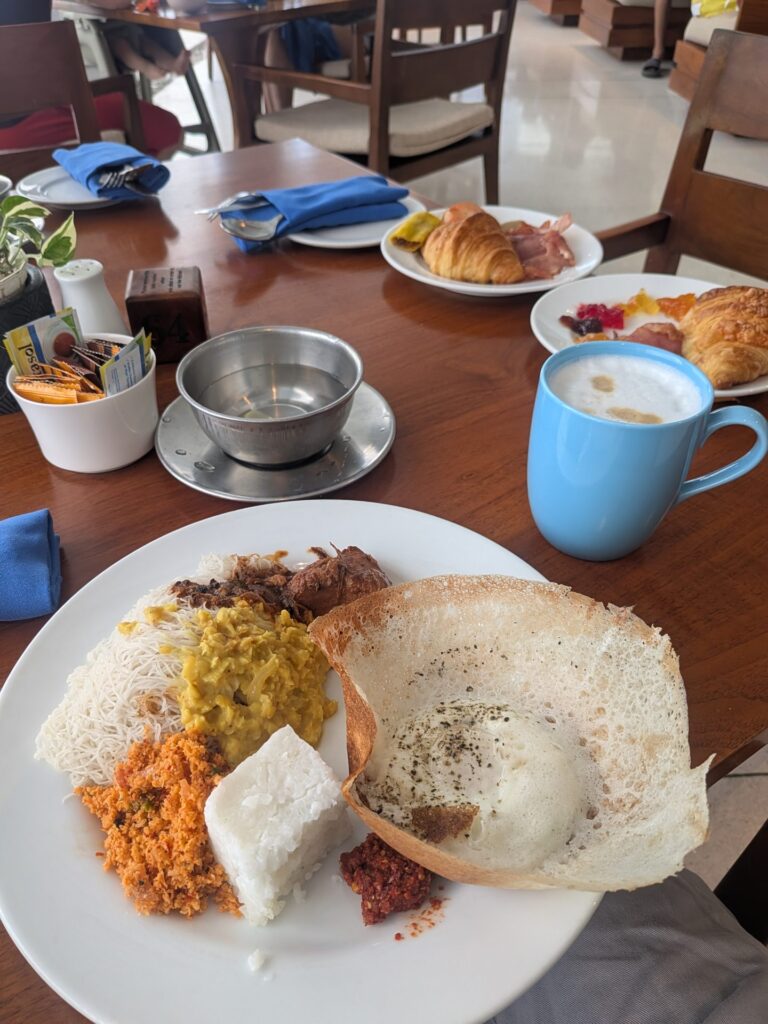 Sri Lankan breakfast with hoppers and curry at Weligama