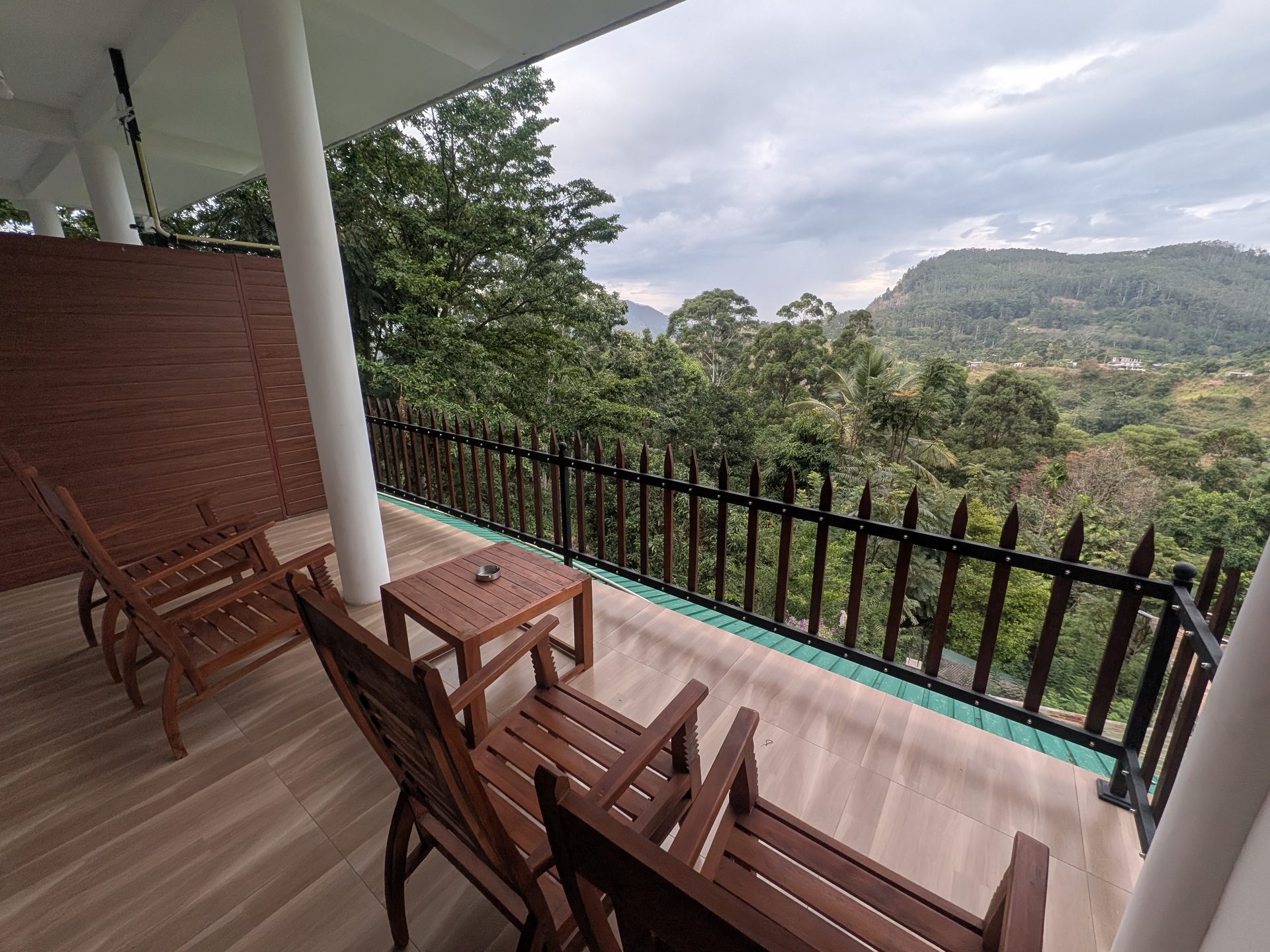 Balcony with chairs at Zircon Ella
